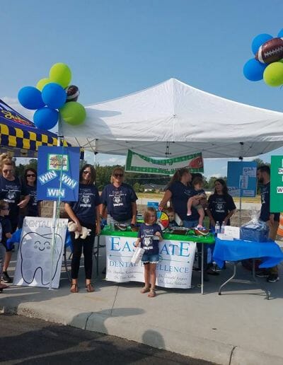 Eastgate Dental Excellence team booth at community service event